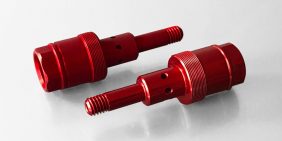 Racing suspension flow valve in red anodised aluminium for the Motorsport industry