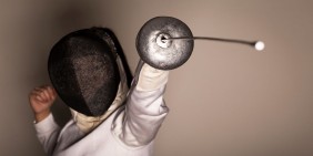 Improved fencing foil tip for increased durability and low friction