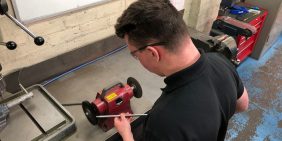 Our apprentice Sam is polishing turned parts threads